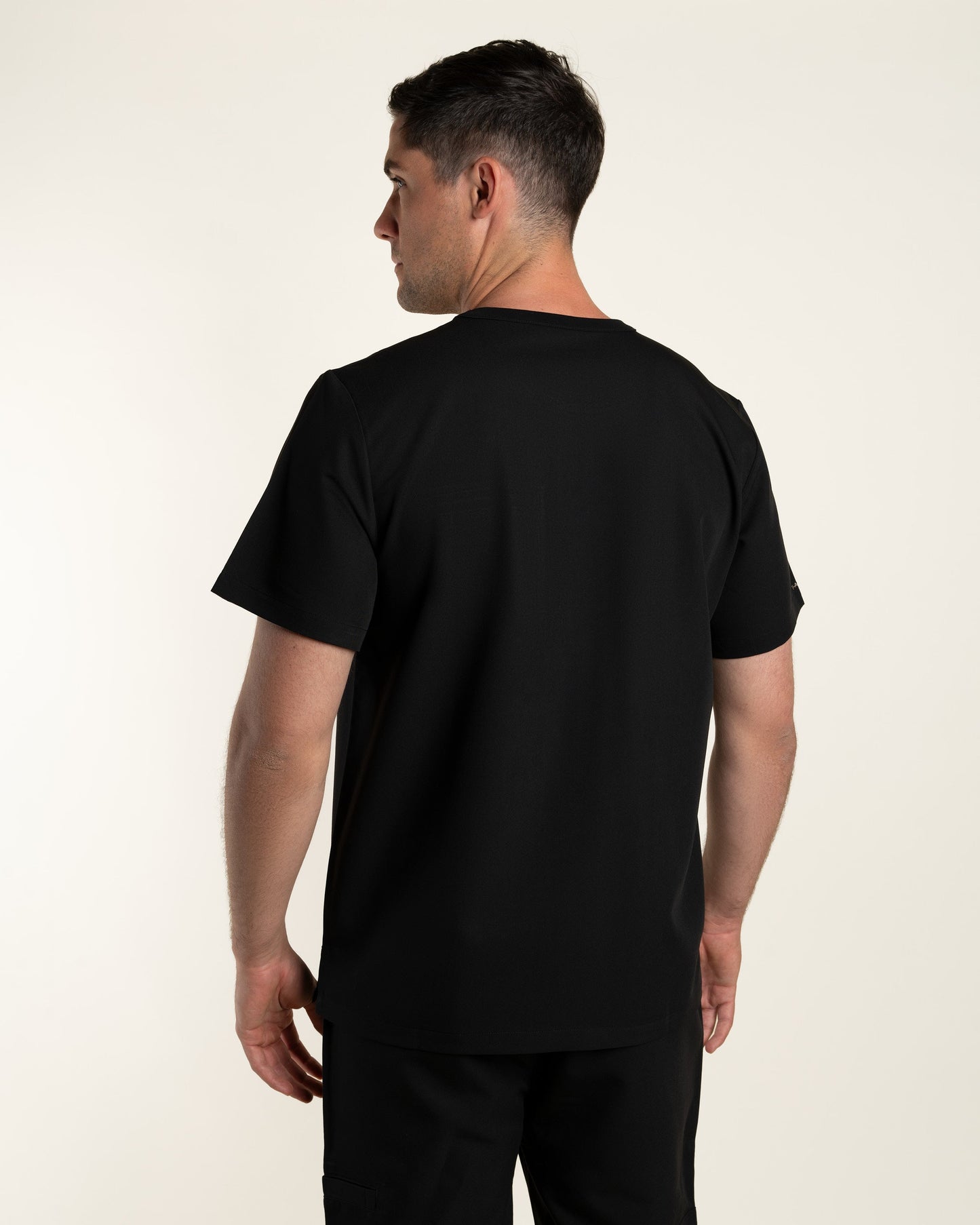 TOP HOMBRE DYNAMIC NEGRO - CUELLO RIB