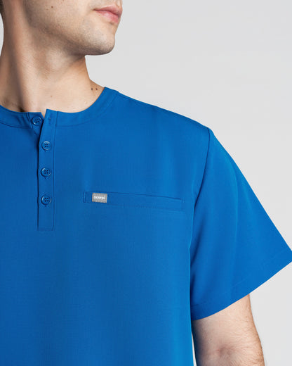 TOP HOMBRE DYNAMIC AZUL REY - CUELLO JOKE