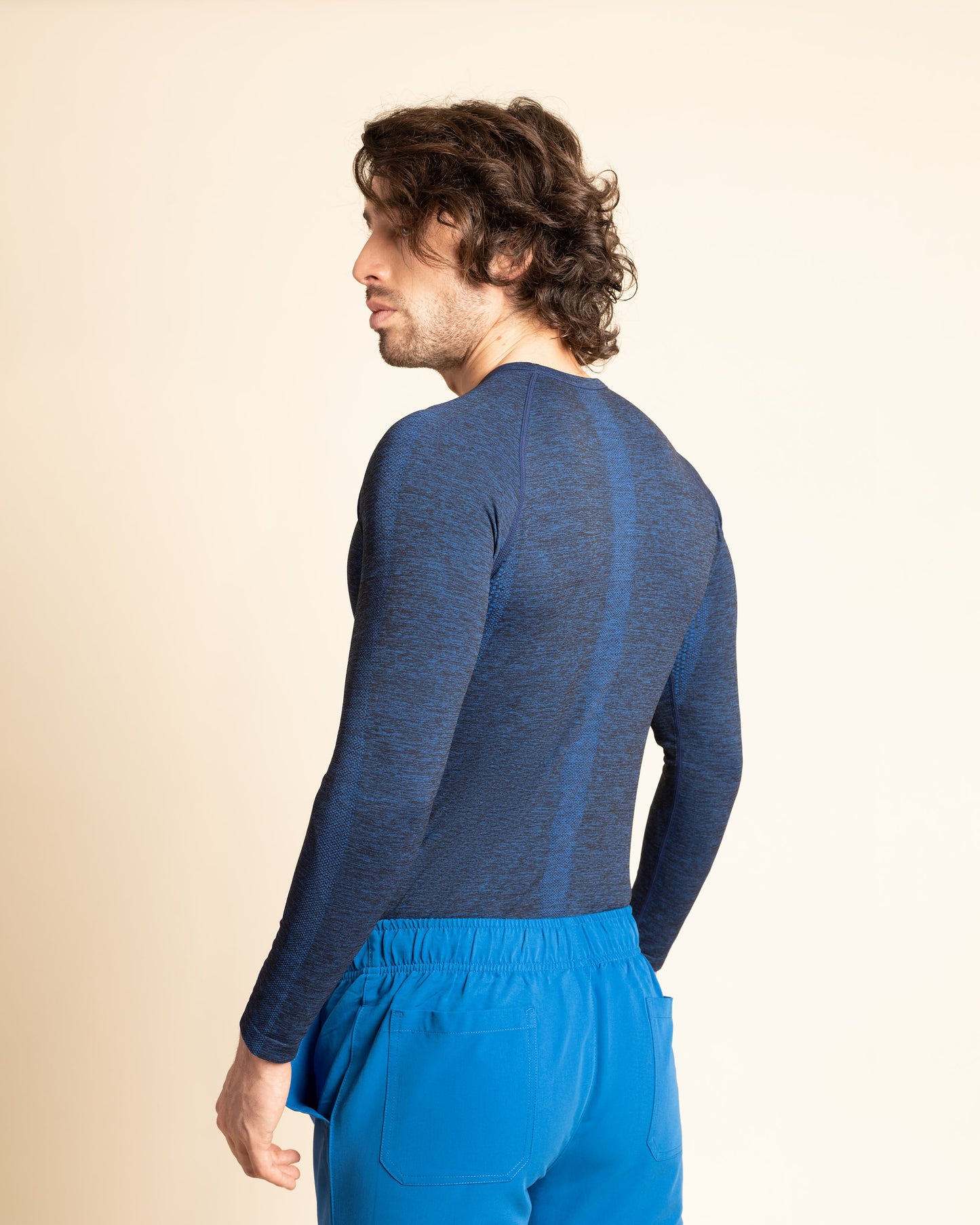PRIMERA CAPA FLEX TEE HOMBRE MELANGE AZUL
